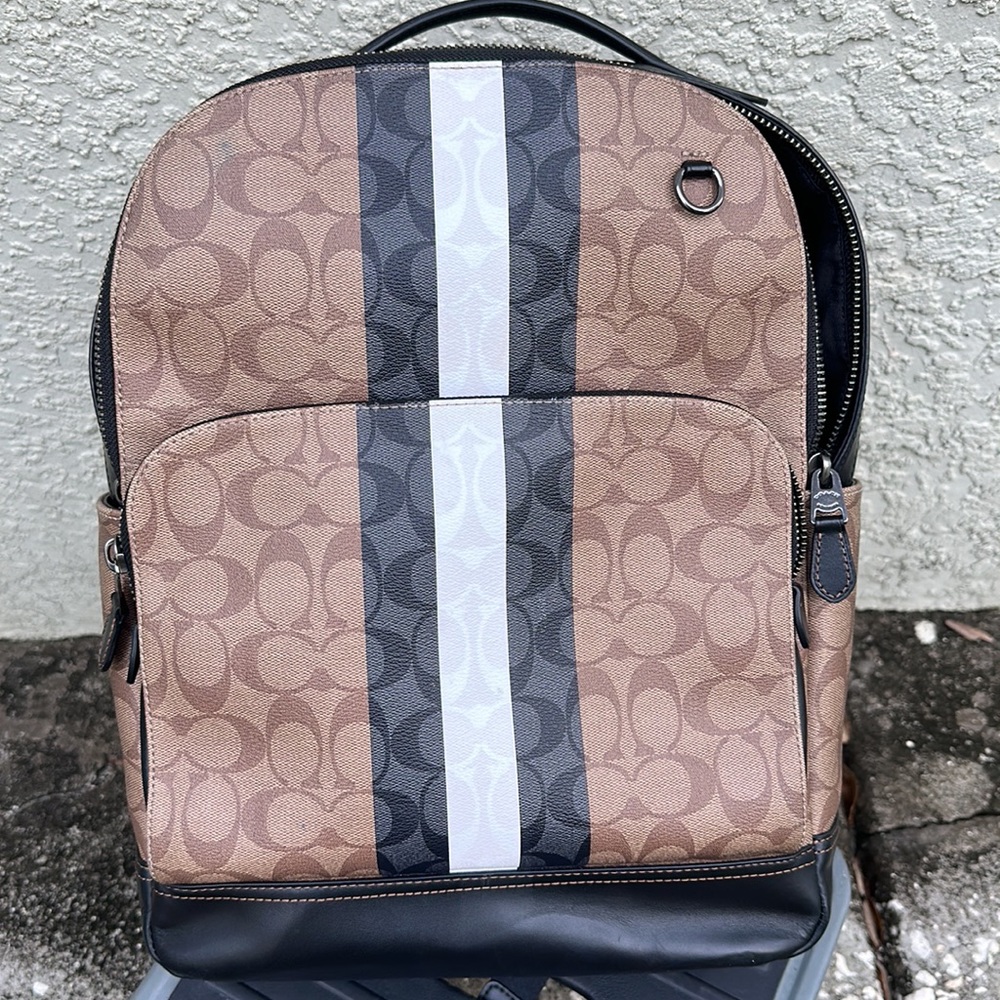 Coach backpack leather with lab top pick inside not even a year old